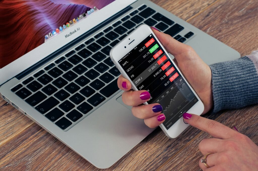 person holding silver iPhone 6 ROI Calculator